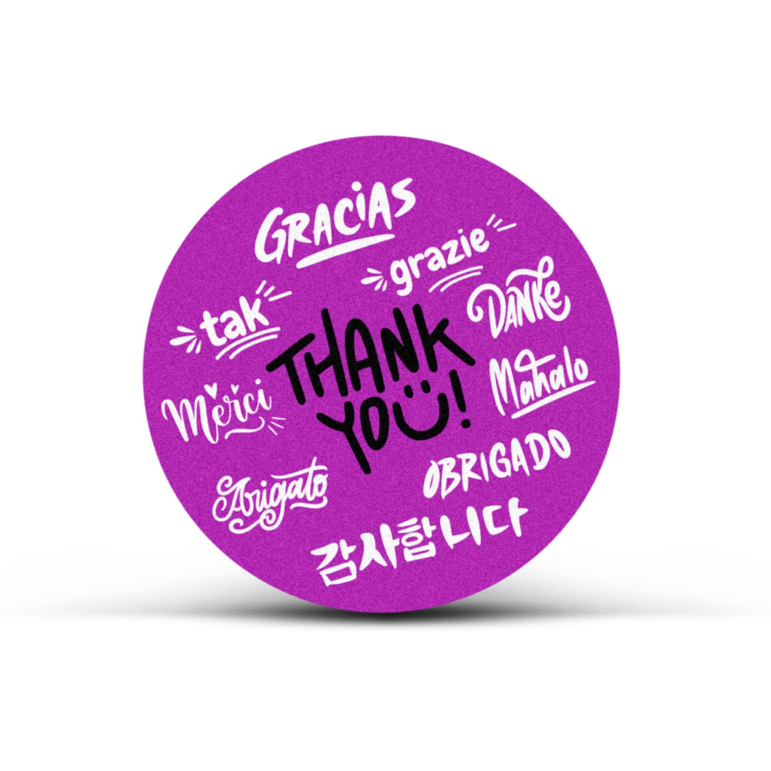 A circular purple sticker featuring the phrase "Thank You" and various translations in different languages. AD Labels 60mm - Circle - Image 1