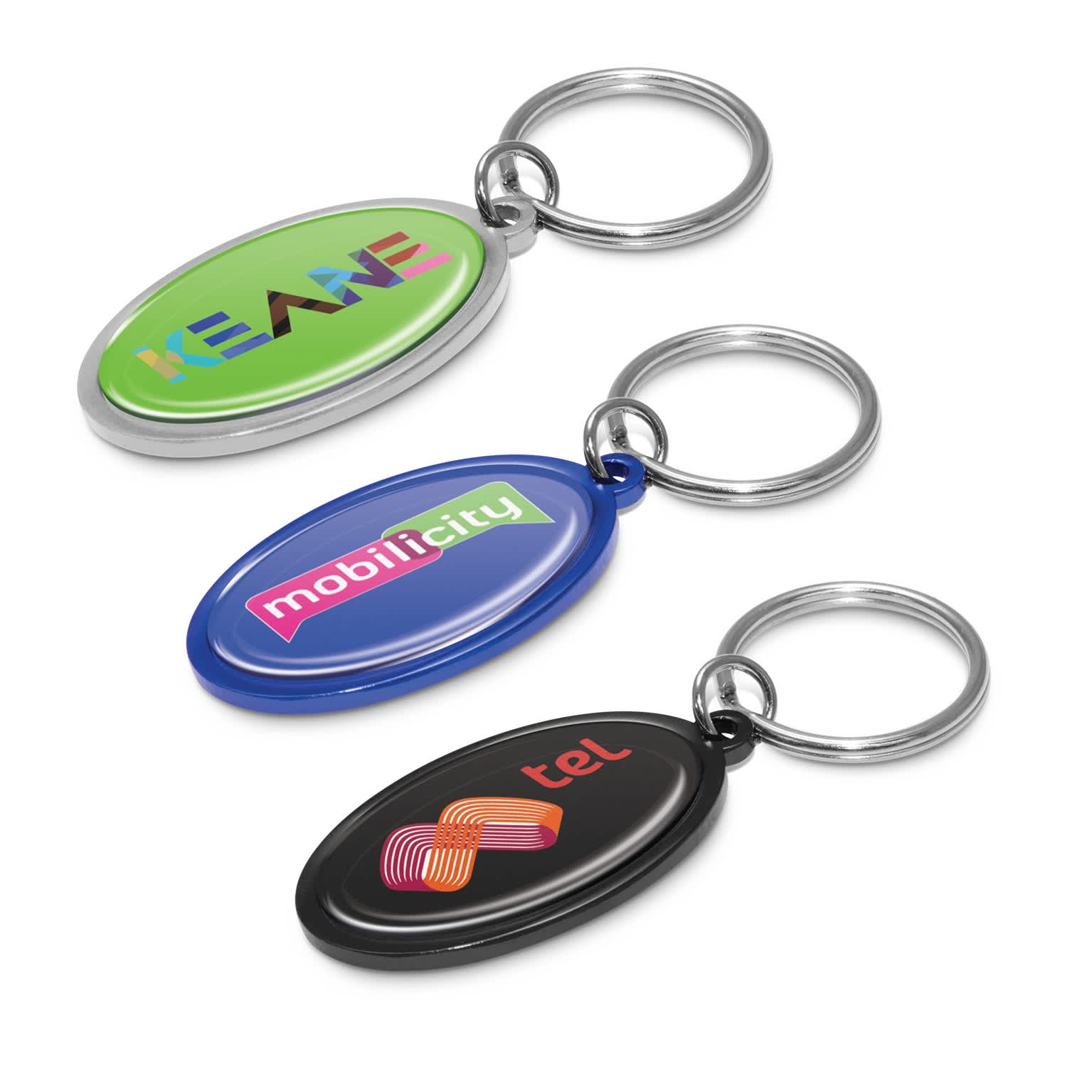 Three oval key rings in green, blue, and black, each featuring a different logo and a metal ring. Surf Key Ring - Image 1