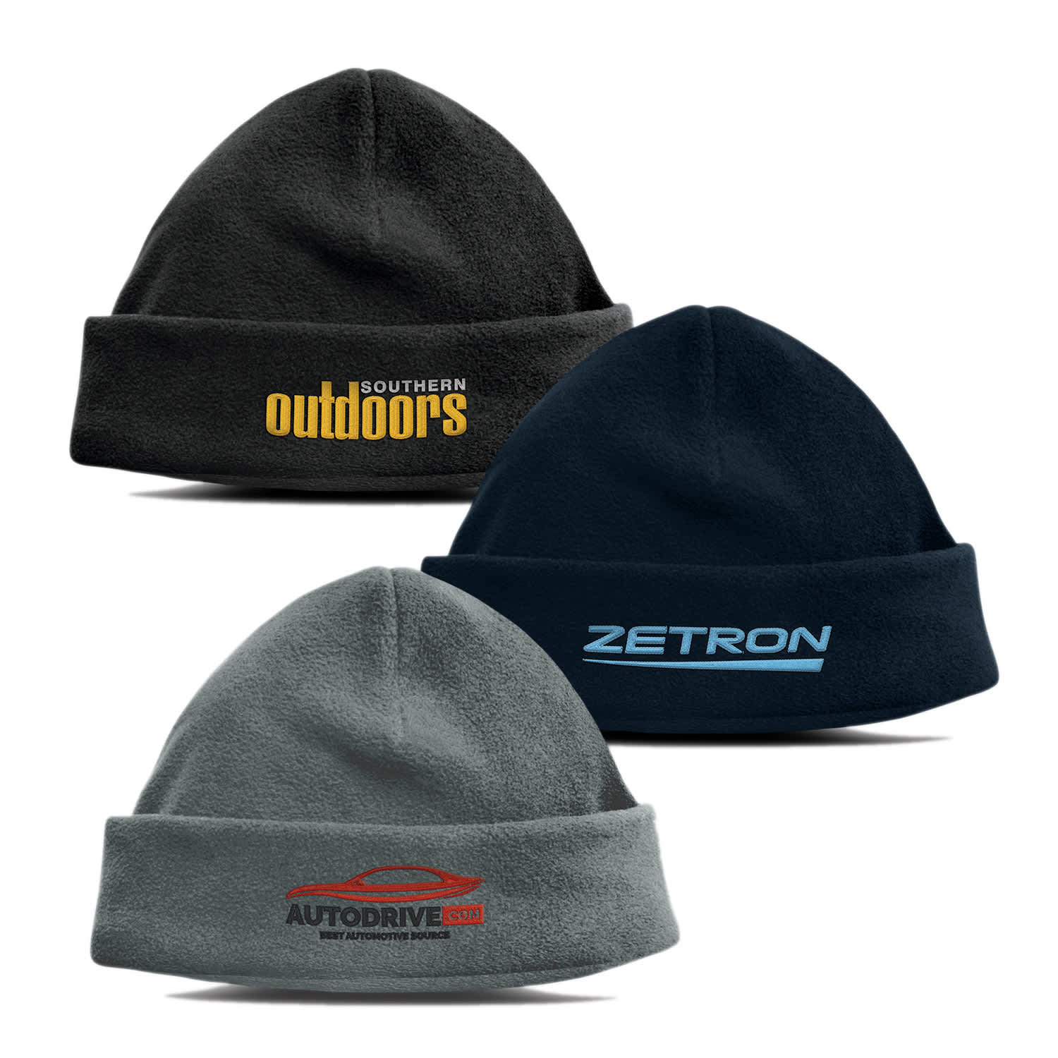A trio of Seattle polar fleece beanies in grey, dark blue, and black, featuring various logos. Seattle Polar Fleece Beanie - Image 1
