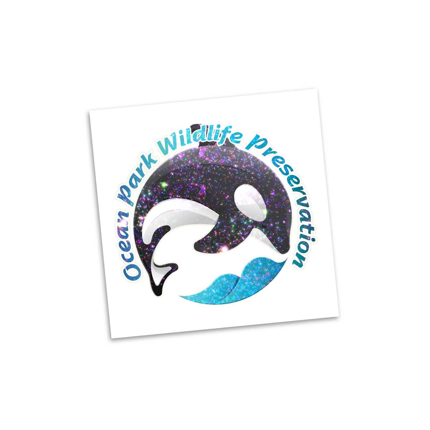 A square temporary tattoo featuring a glittery design of a whale with hues of black, purple, and blue, including a logo. Temporary Tattoo Glitter - 51mm x 51mm - Image 1