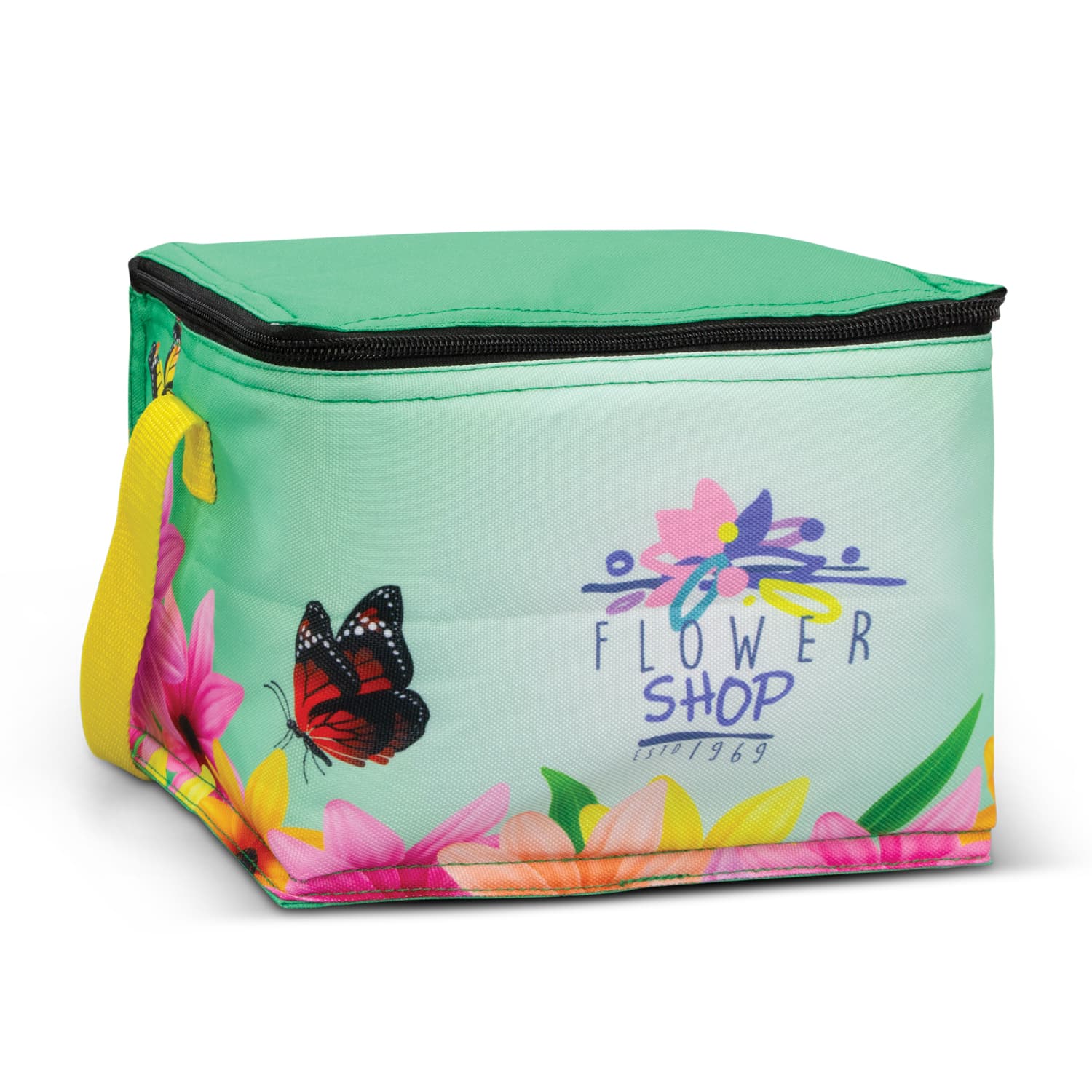 A green cooler bag featuring vibrant floral designs and a butterfly, with a yellow handle and a zip closure. Alaska Cooler Bag - Full Colour - Image 1