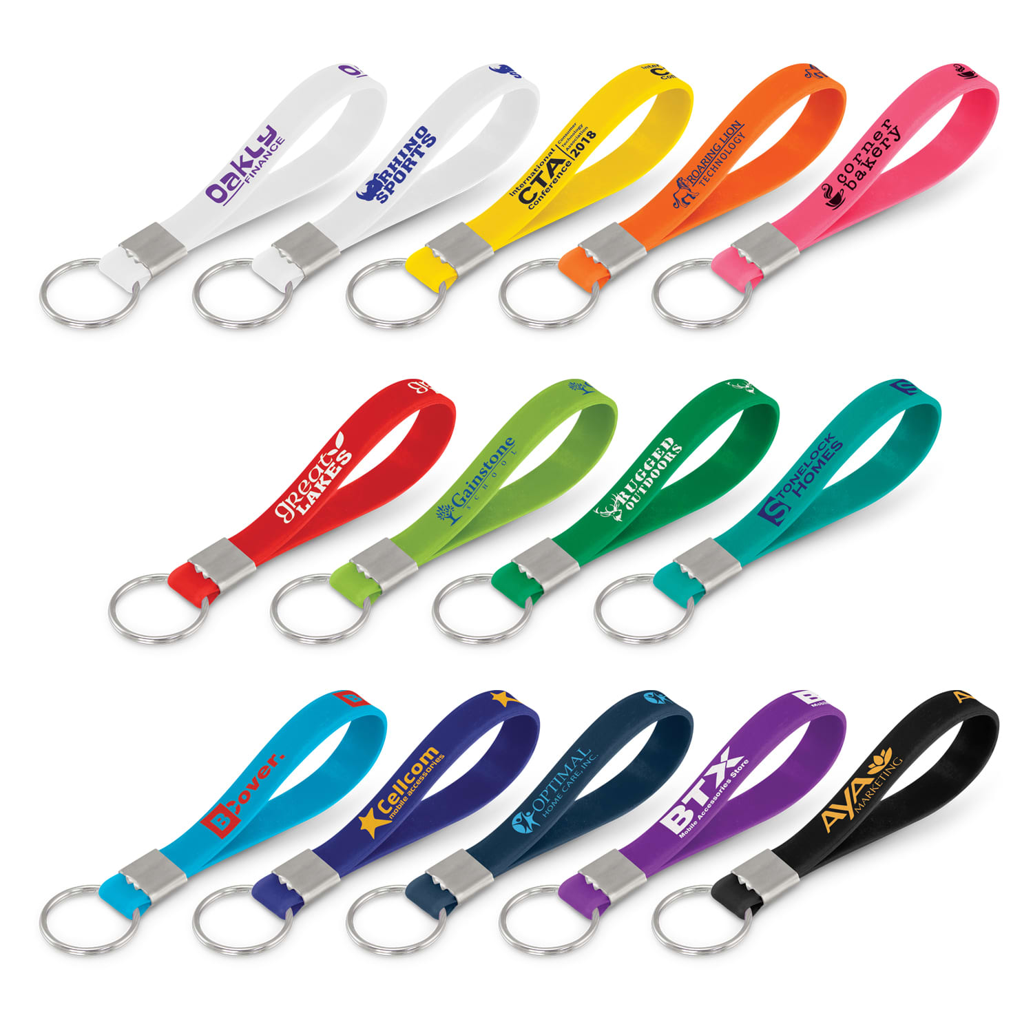 A collection of silicone key rings in various colours, each with a metal keyring attachment, featuring logos. Silicone Key Ring - Image 1