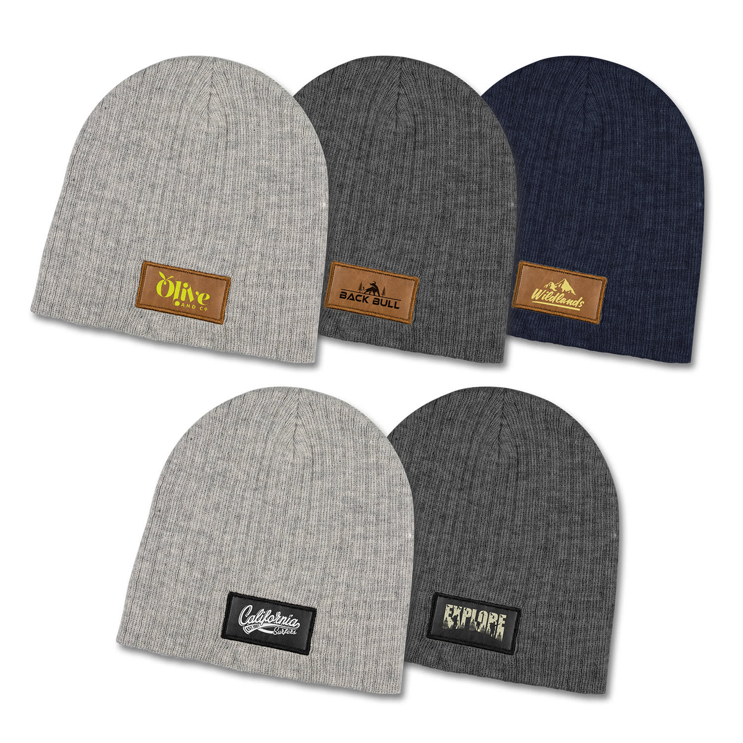 A collection of Nebraska Heather cable knit beanies in grey, navy, and charcoal with various patches. Nebraska Heather Cable Knit Beanie With Patch - Image 1