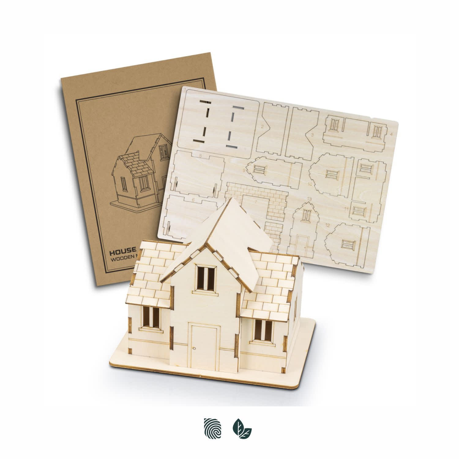 A wooden model kit of a house in natural wood colour, including a detailed layout and assembly guide. BRANDCRAFT House Wooden Model - Image 1
