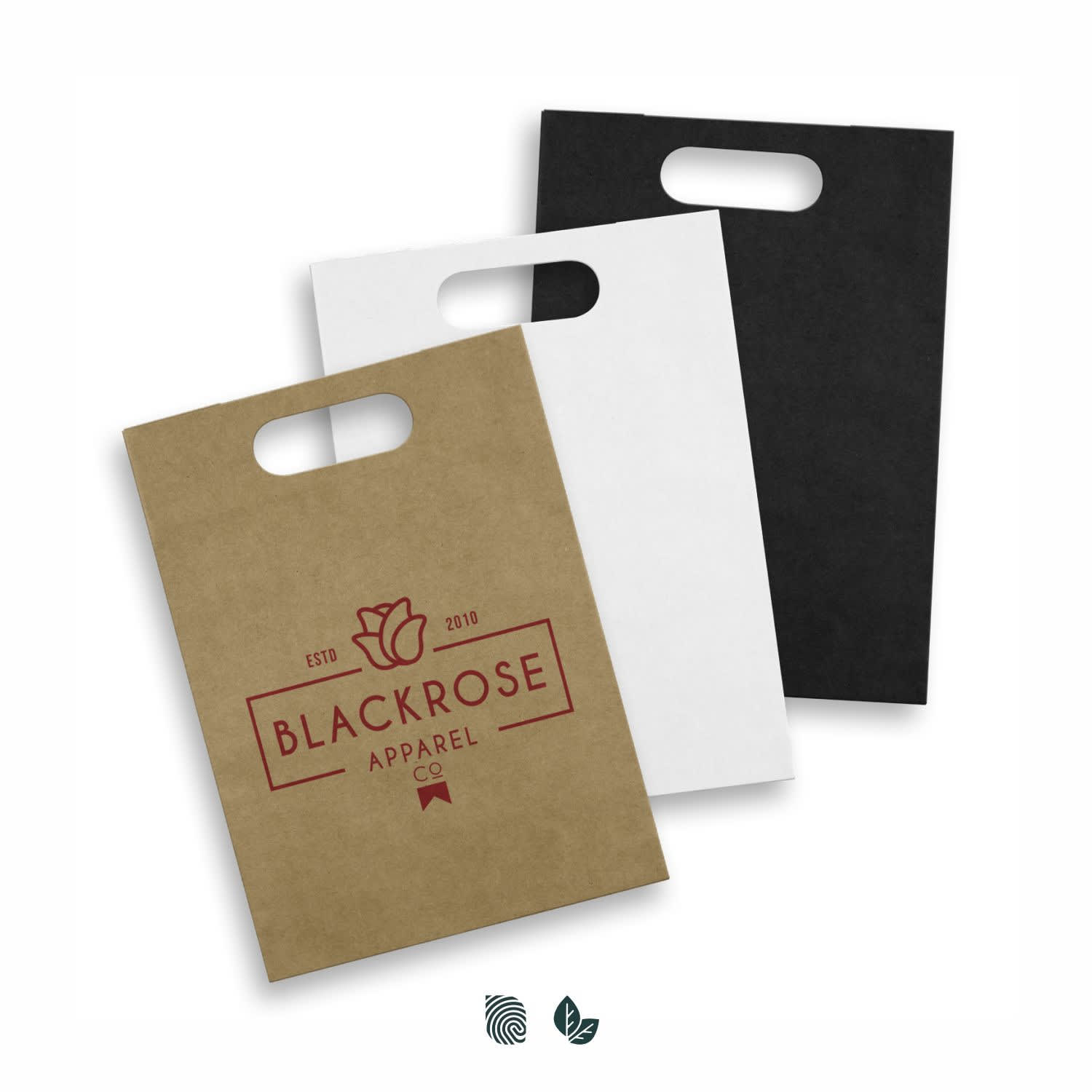 Three large die cut paper bags in brown, white, and black, featuring a logo on the front. Large Die Cut Paper Bag Portrait - Image 1