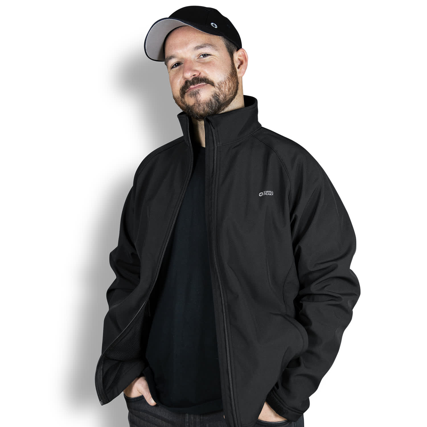 A man wearing a black Swiss Peak Urban Softshell Jacket with a branded logo, set against a plain background. Swiss Peak Urban Softshell Jacket - Image 1