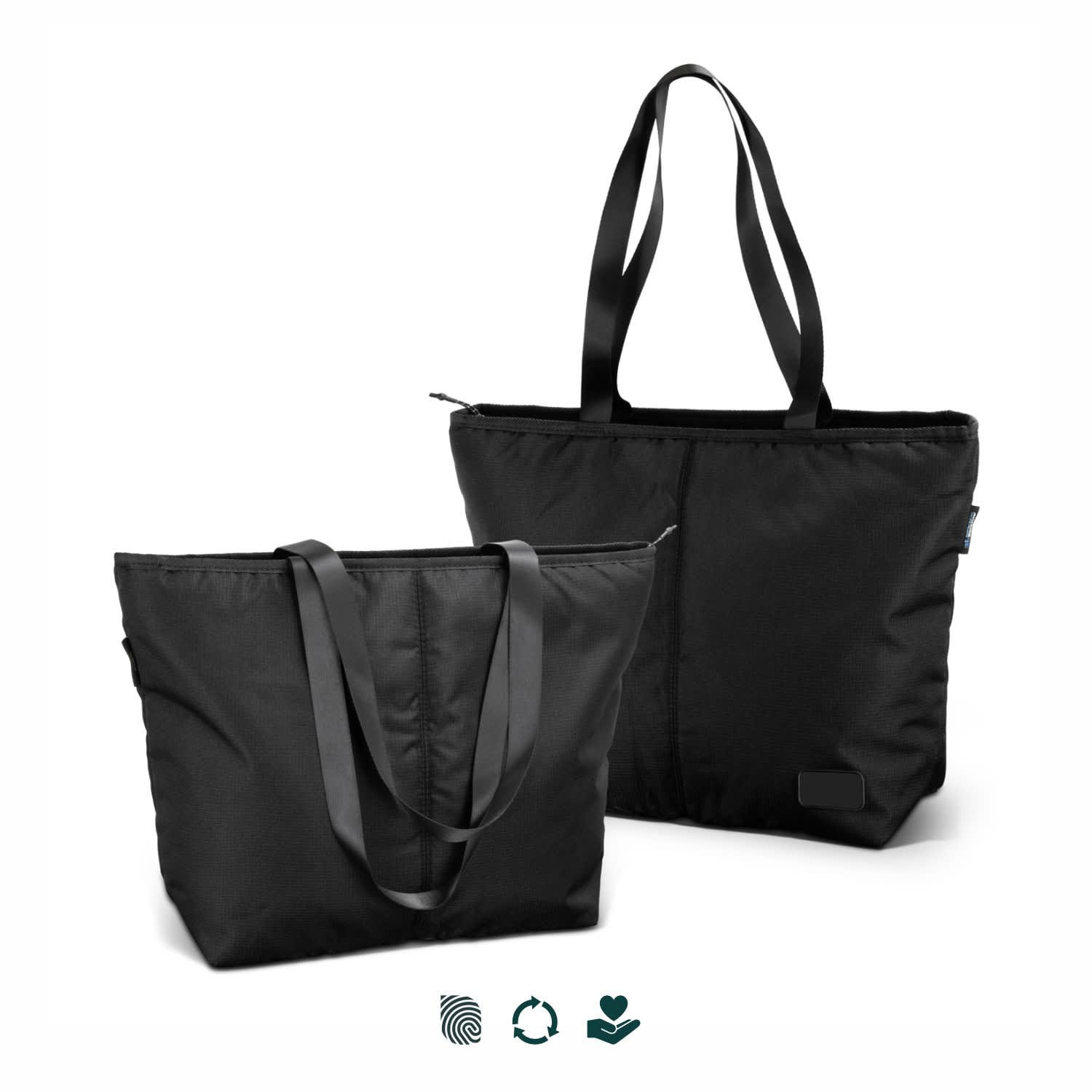 A black tote bag with dual shoulder straps, featuring a zippered closure and a simple design. It has a logo on the side. SPICE Waste2Gear Neo Cooler - Image 1