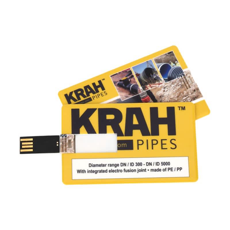 A yellow credit card-sized flash drive with a USB connector and a logo, featuring images related to pipes. Credit Card Flash Drive - Image 1
