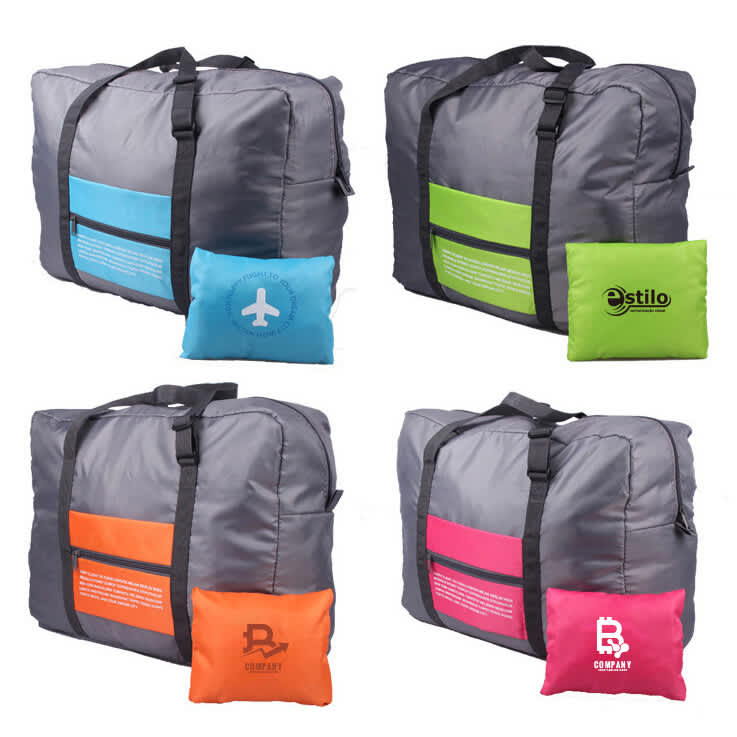 A grey travel compressed bag with bright green, pink, and orange accents, accompanied by colourful pouch options. Travel compressed Bag - Image 1
