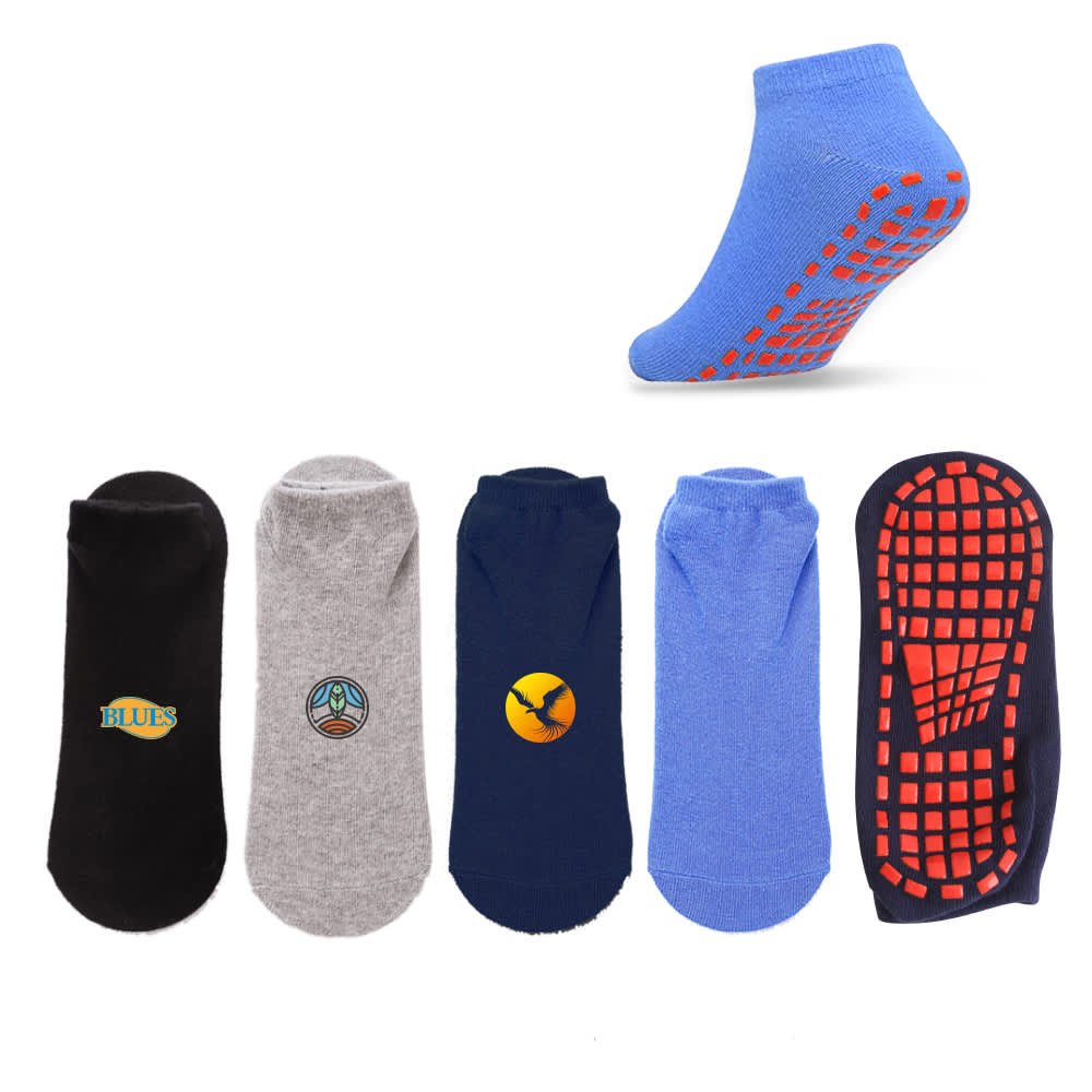 A variety of low cut gripper socks in black, grey, navy, and blue, featuring different designs and non-slip grip. Low Cut Gripper Socks - Image 1