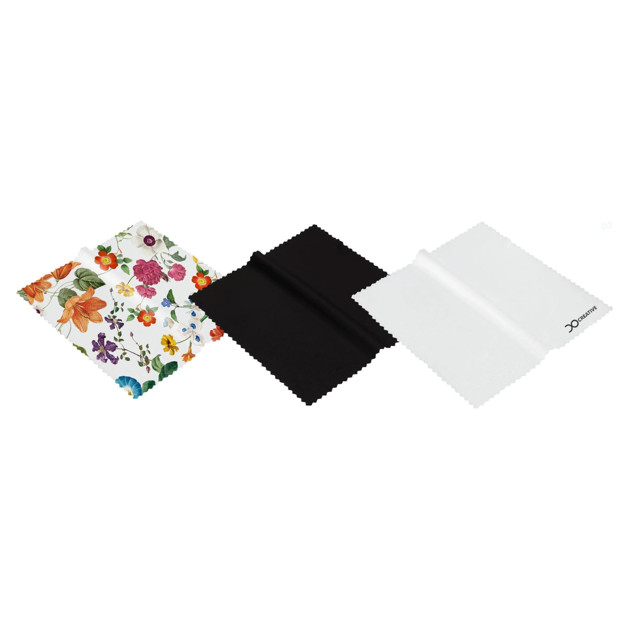 A set of three RPET lens cloths in floral, black, and white designs, featuring varied textures and shapes. RPET Lens Cloth - Image 1