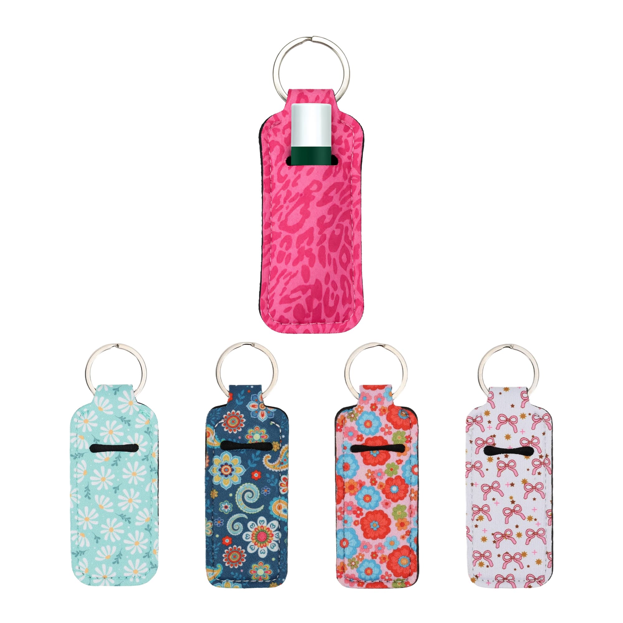 A collection of five Neoprene Lipstick Bags in various colours and floral patterns, with a keyring attachment on each. Neoprene Lipstick Bag - Image 1