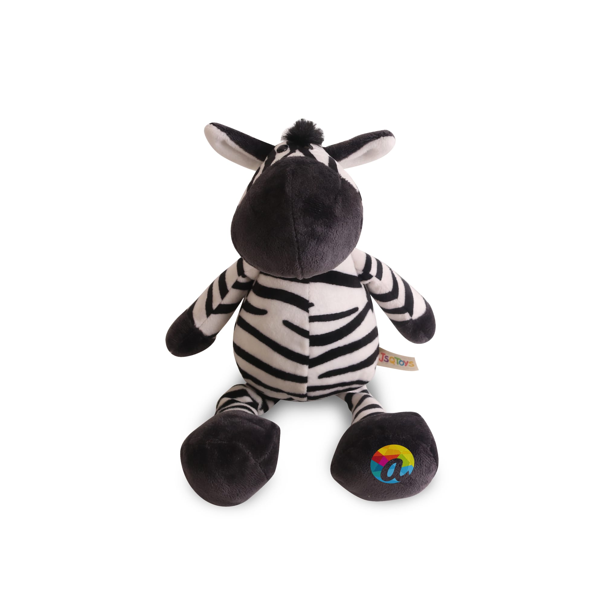 A plush zebra toy in black and white stripes with a soft, rounded body and a colourful logo on its foot. Zebra Plush Toy - Image 1