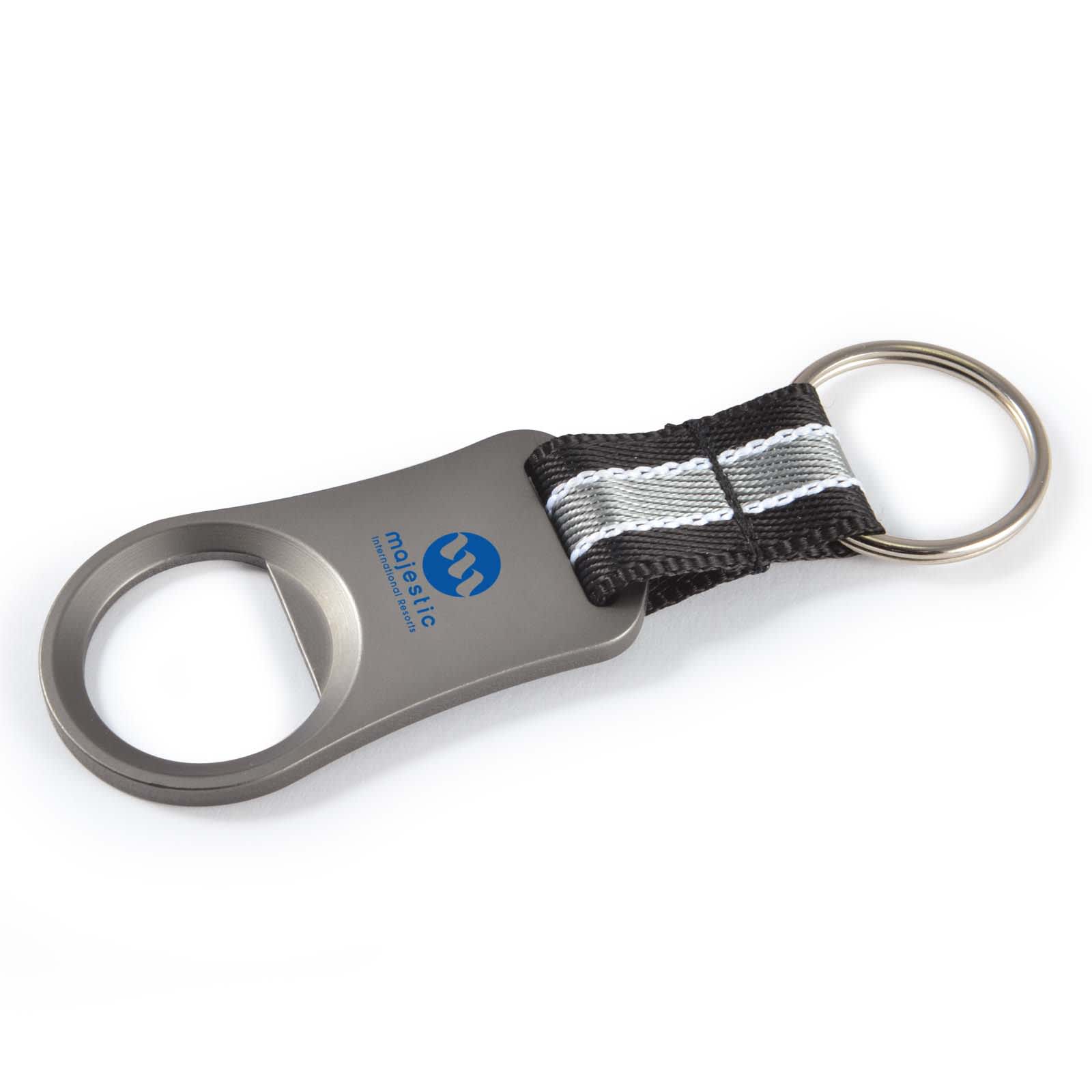 A drink bottle opener in silver metal with a black fabric handle and a ring for keychain attachment. Arvo Bottle Opener - Image 1