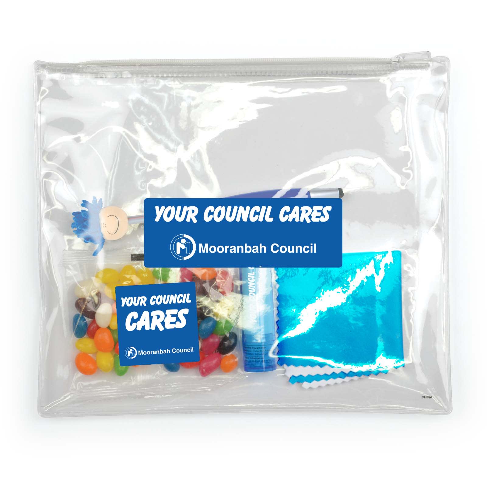 A clear pouch containing colorful candies, a lip balm, a small blue package, and a cleaning cloth, with branding visible. Intro Pack - Image 1