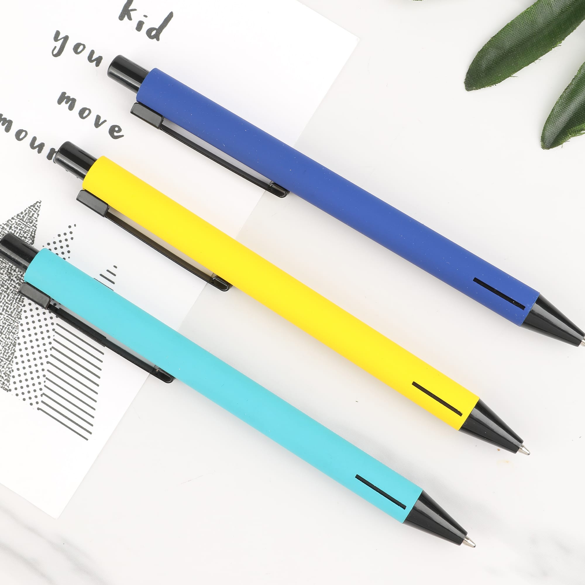 Three metal pens displayed in turquoise, yellow, and blue colours, featuring a sleek design and a clip. Knoxil - Image 1