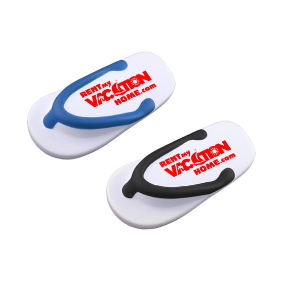 A pair of flip-flop shaped stress relievers in white with blue and black accents, featuring a logo. Flops Shape Stress Reliever - Image 1