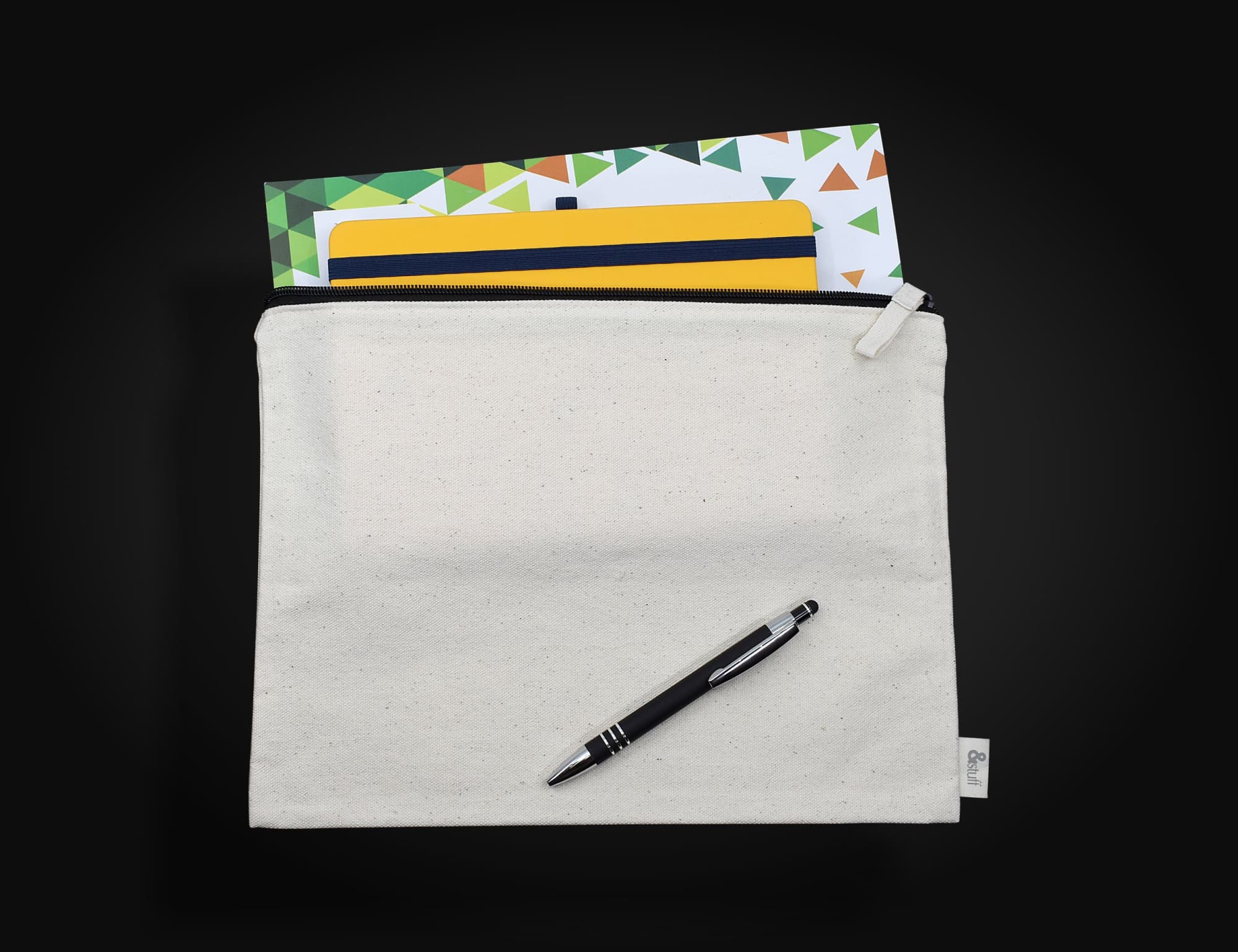 A cream-coloured conference bag featuring a zip closure, with a pen and assorted notepads visible inside. Calico Conference Bag 25cm x 34cm - Image 1