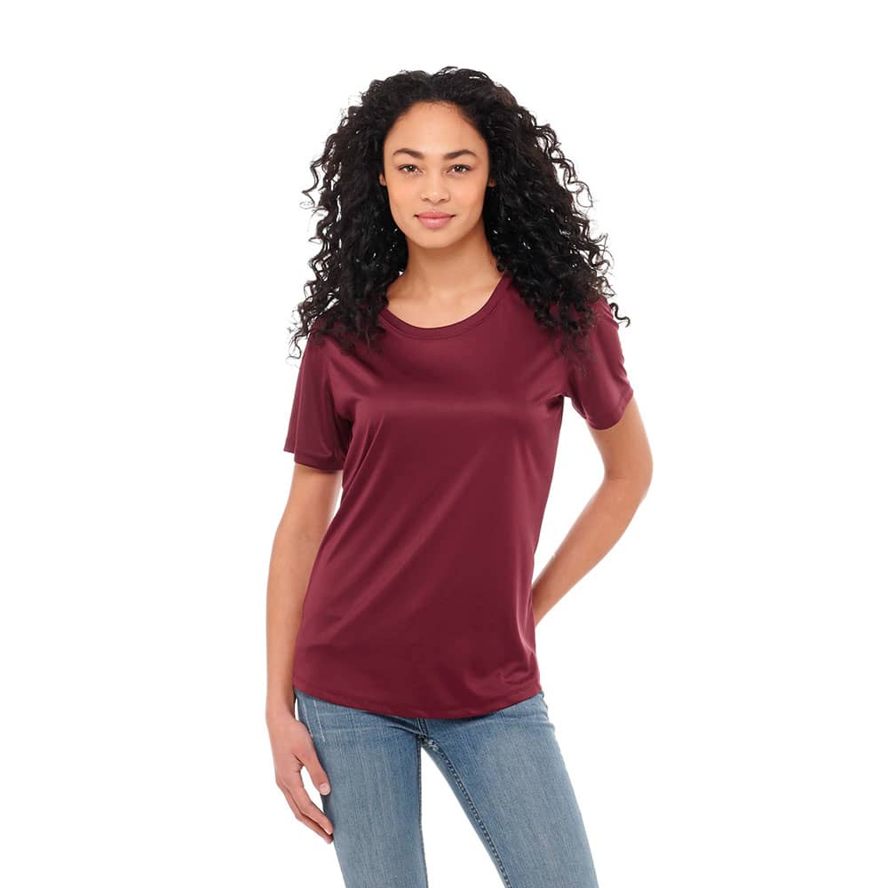 A maroon short sleeve tech tee for women, featuring a smooth fabric and a standard fit, with a logo present. Omi Short Sleeve Tech Tee - Womens - Image 1