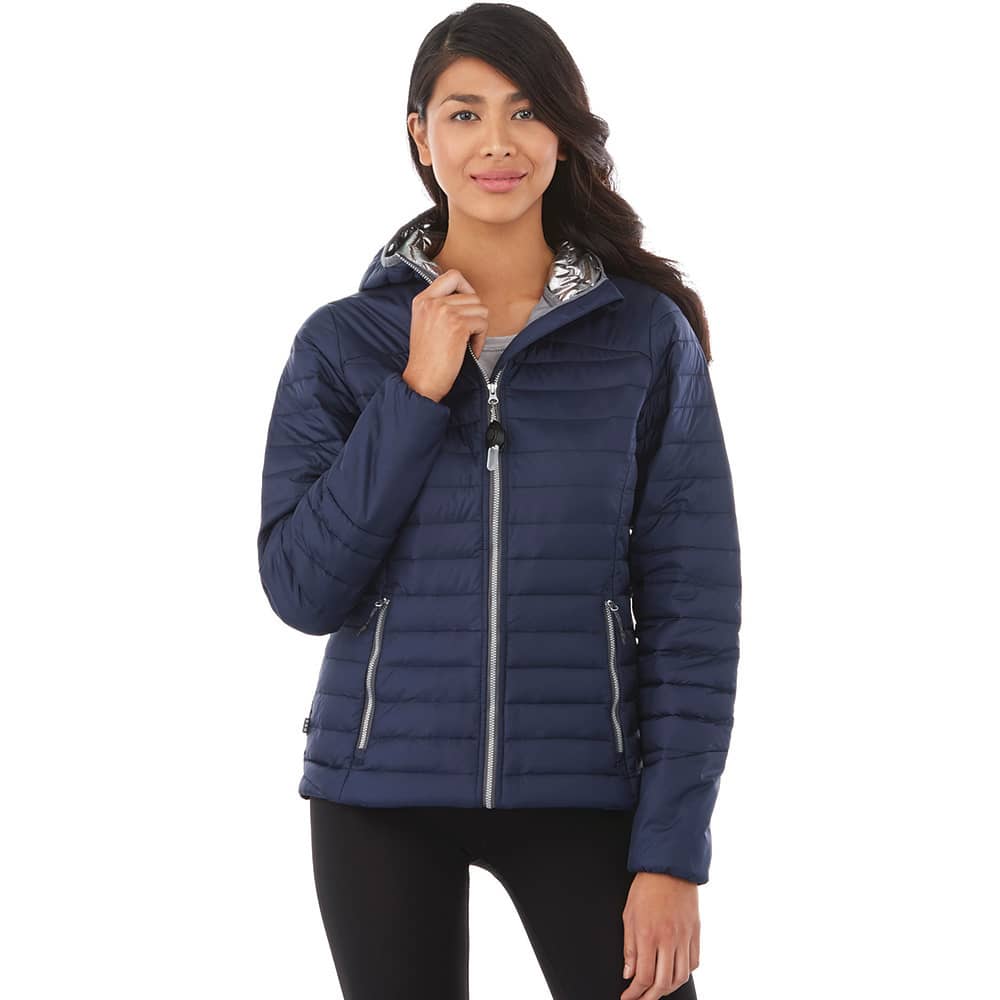 A navy blue women's insulated jacket with a hood, featuring a silver interior and zippers for pockets. Silverton Packable Ins Jkt - Womens - Image 1