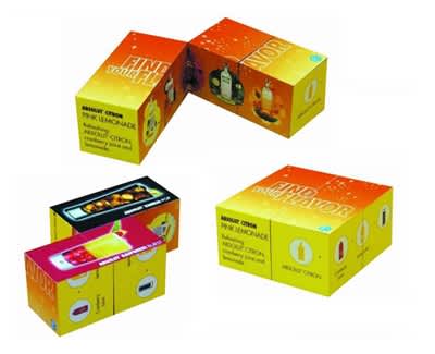 A collection of brightly coloured boxes featuring the "Magic Block" product, each with different flavours and a logo. Magic Block - Image 1