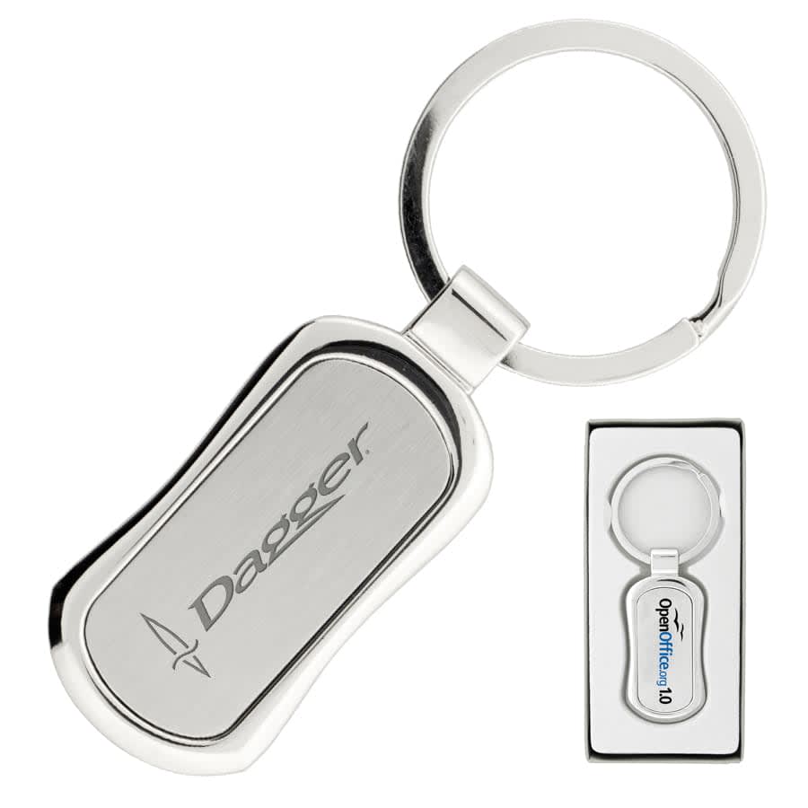 A silver keychain with a sleek design and a circular keyring, presented in a black box. It features a logo. The Corsa Keychain - Image 1