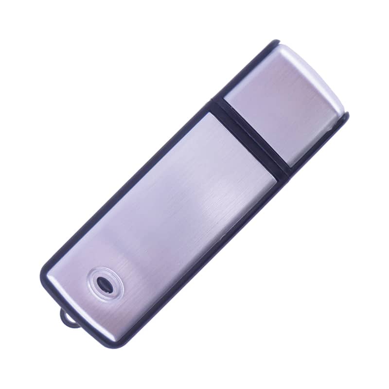 A sleek silver flash drive with a black casing and a small loop attachment for convenience. Pluto Flash Drive - Image 1