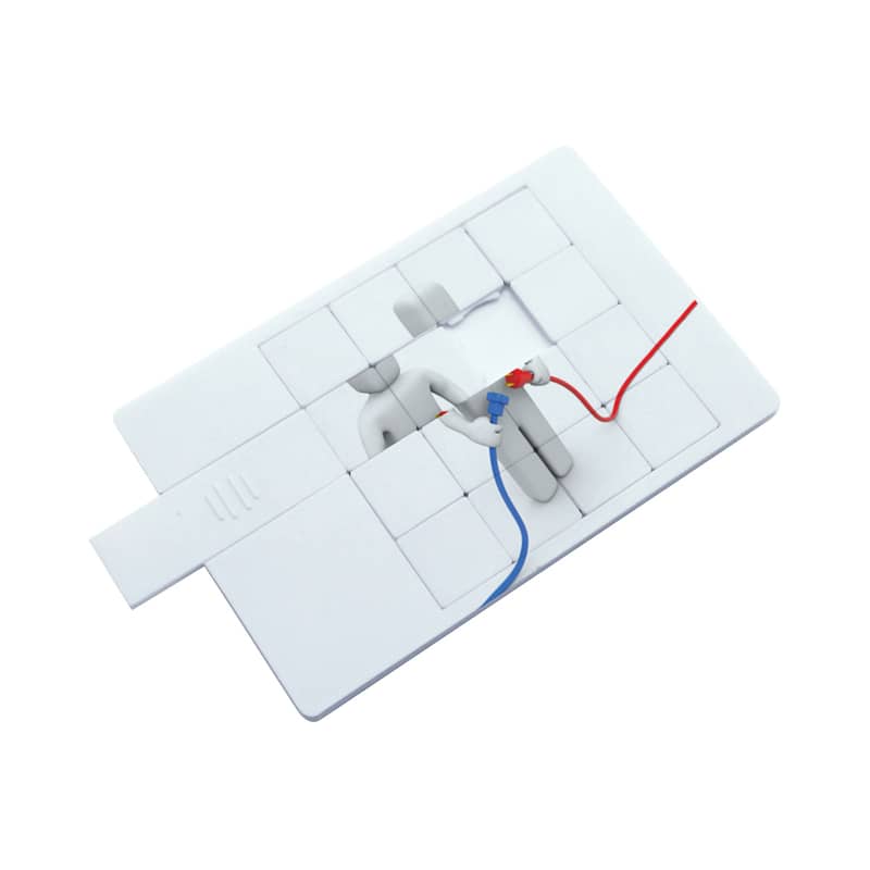 A white puzzle credit card flash drive with red and blue connectors on a puzzle piece design. It includes a logo. Puzzle Credit Card Flash Drive - Image 1