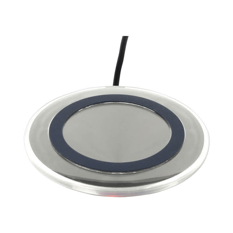 A round silver wireless charger with a black ring around the centre and a connected cable. Sage Wireless Charger - Image 1