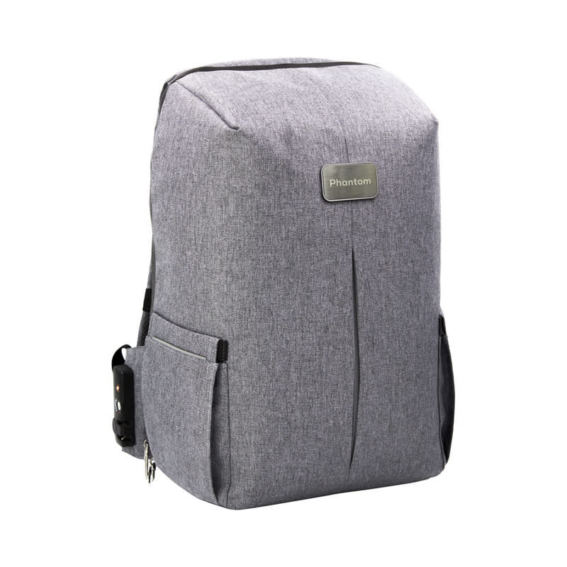 A grey backpack with a sleek design, featuring side pockets and a logo on the front. Phantom Anti-Theft BackPac - Image 1
