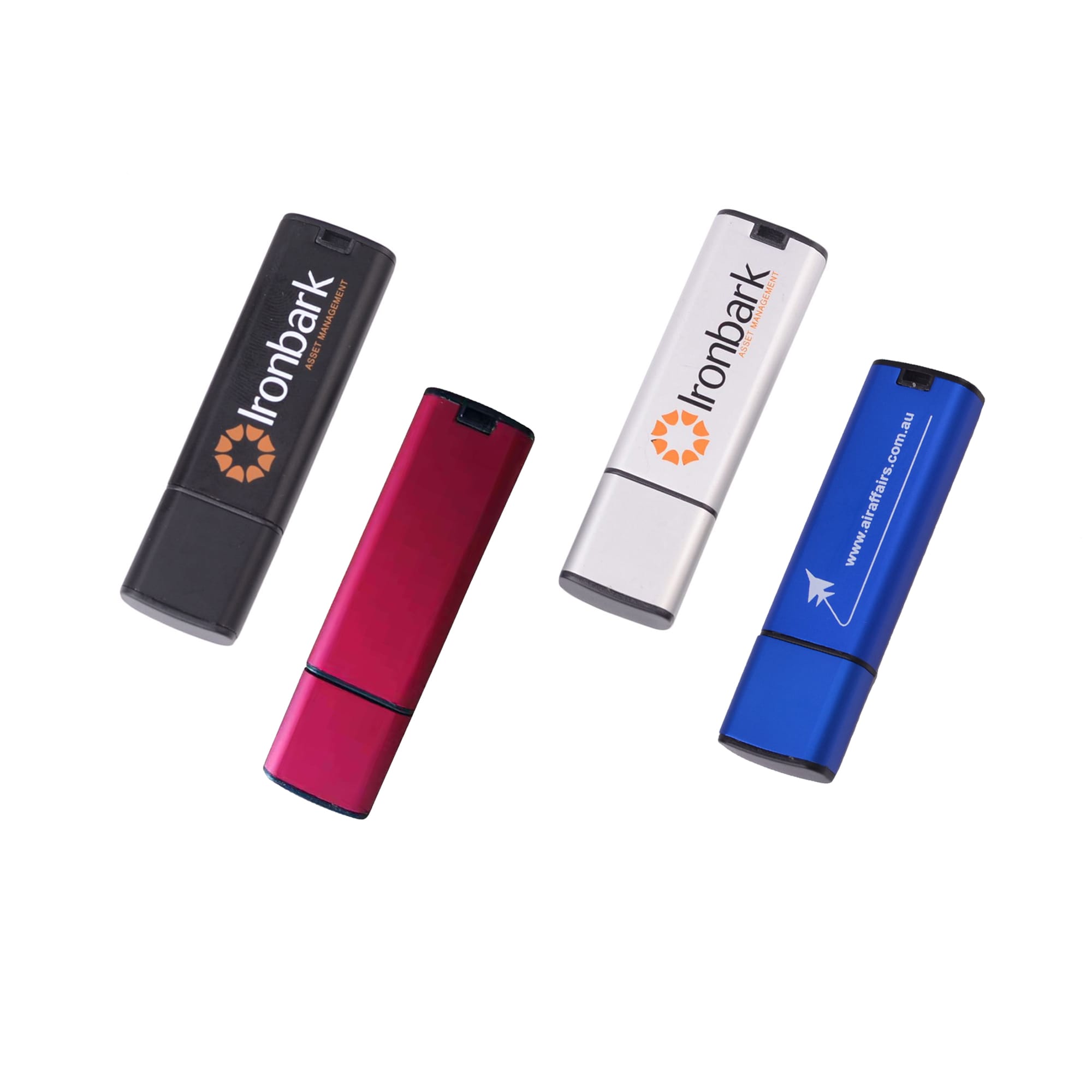 A set of four flash drives in black, pink, silver, and blue, each with a logo or branding. Harper Flash Drive - Image 1
