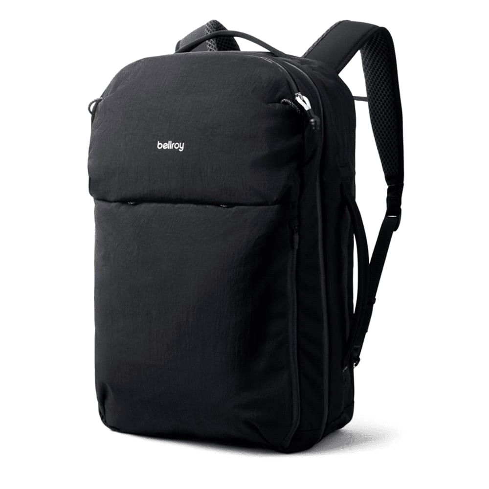 A black backpack with multiple compartments and padded shoulder straps, featuring a logo on the front. Bellroy Lite Travel Pack 30L - Image 1