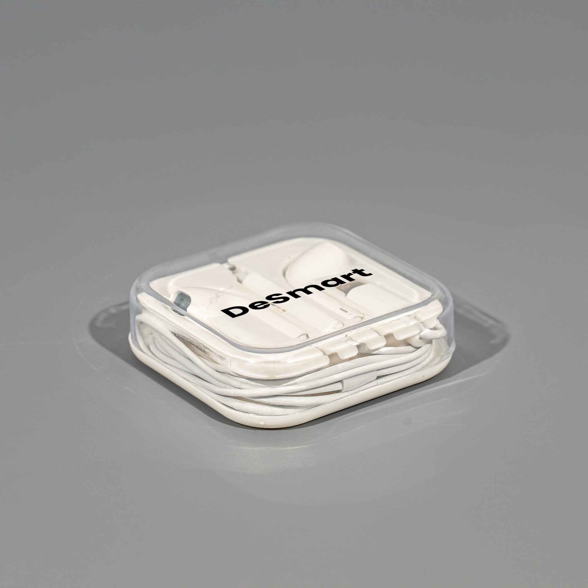 A white USB Type C earphone packaged in a clear case, featuring a logo on the top. Vibe USB Type C earphone - Image 1