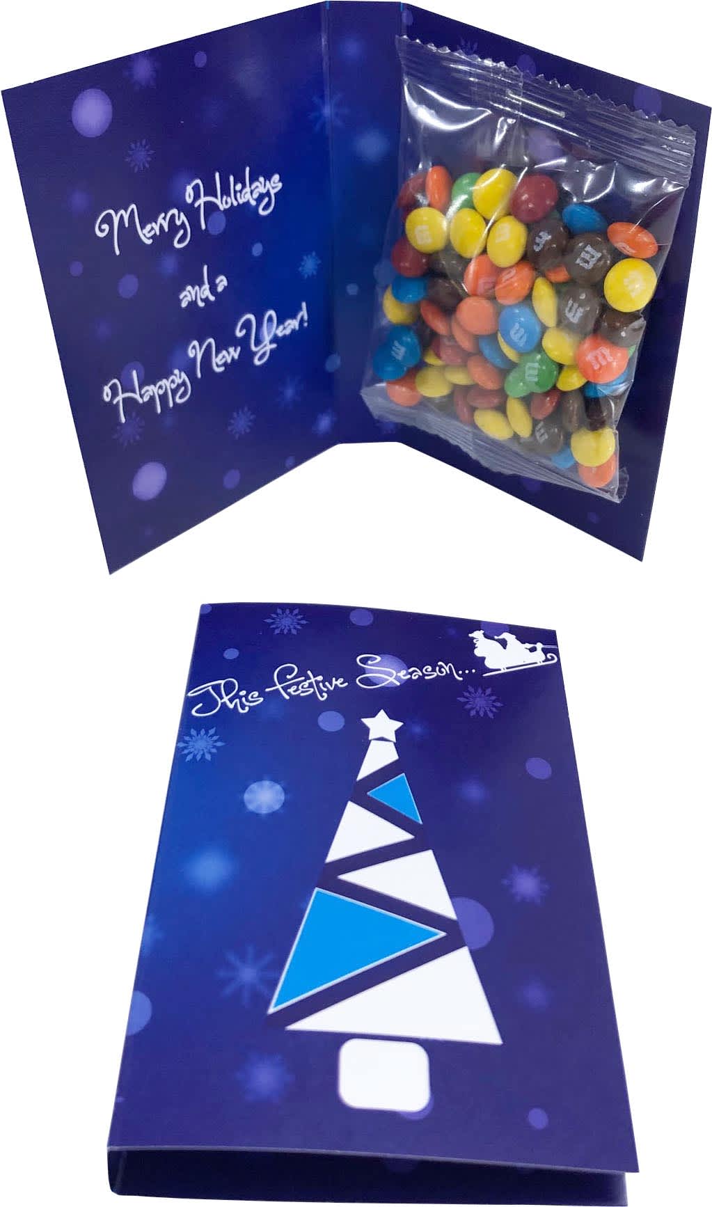 A gift card with a 25g bag of colourful M&M chocolates inside a festive blue card. The card features a Christmas tree design. Gift Card with Mini M&Ms 25g - Image 1
