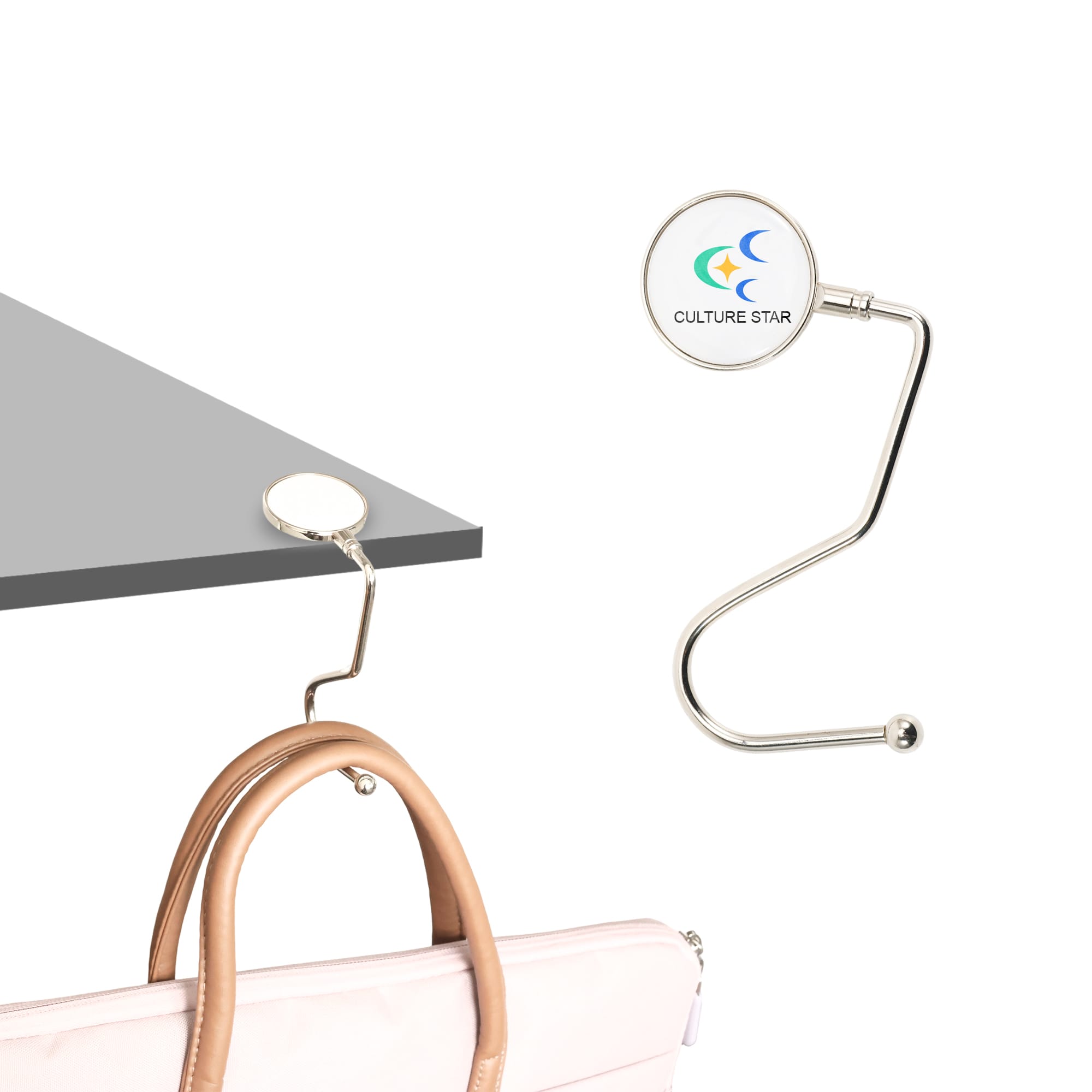 A round, curved desk hook in silver, featuring a circular logo, with a smooth, sleek design for hanging items. Round Curved Desk Hook - Image 1