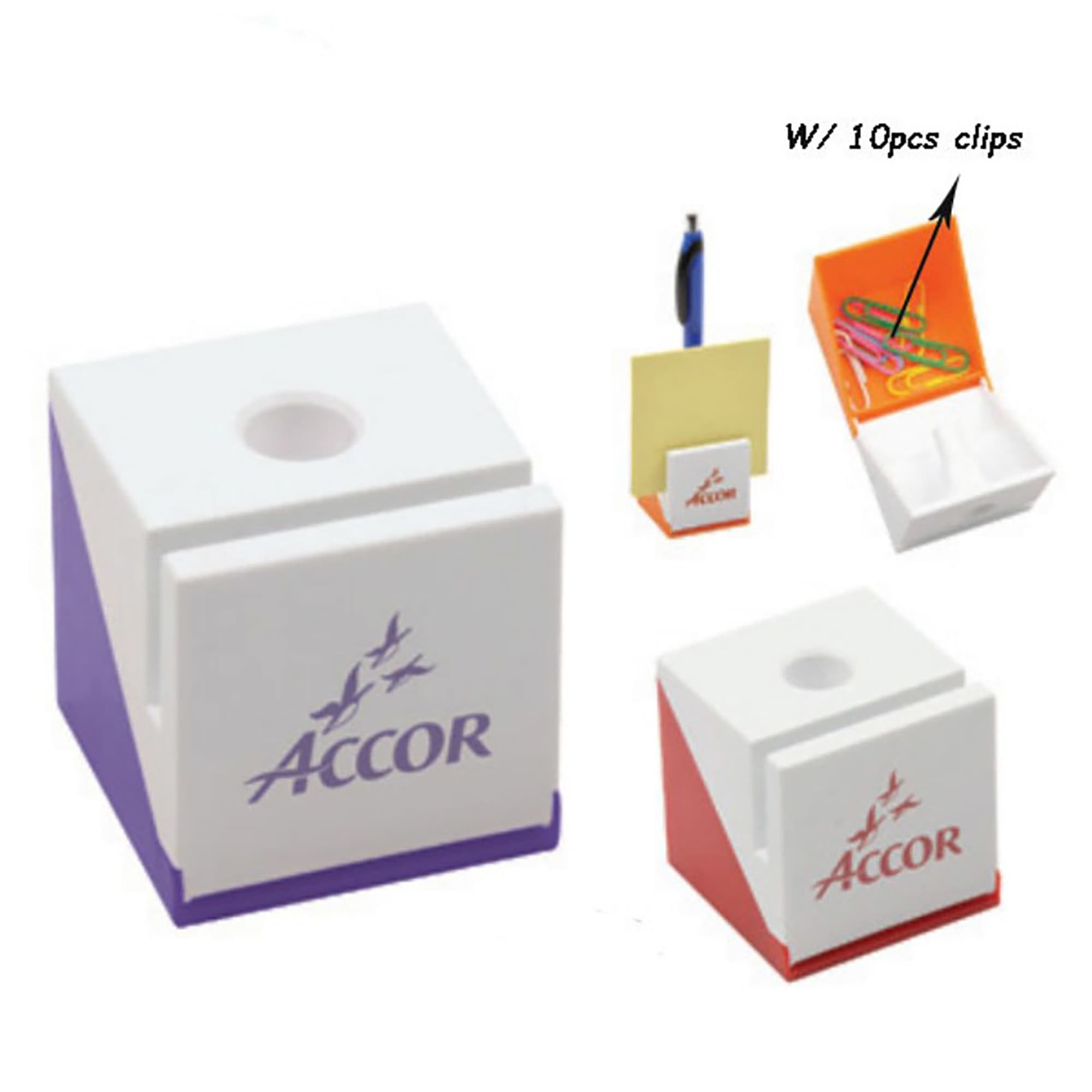 A pen holder with a clip in white and purple, featuring a logo, alongside clips and paper items. Pen Holder with Clip - Image 1
