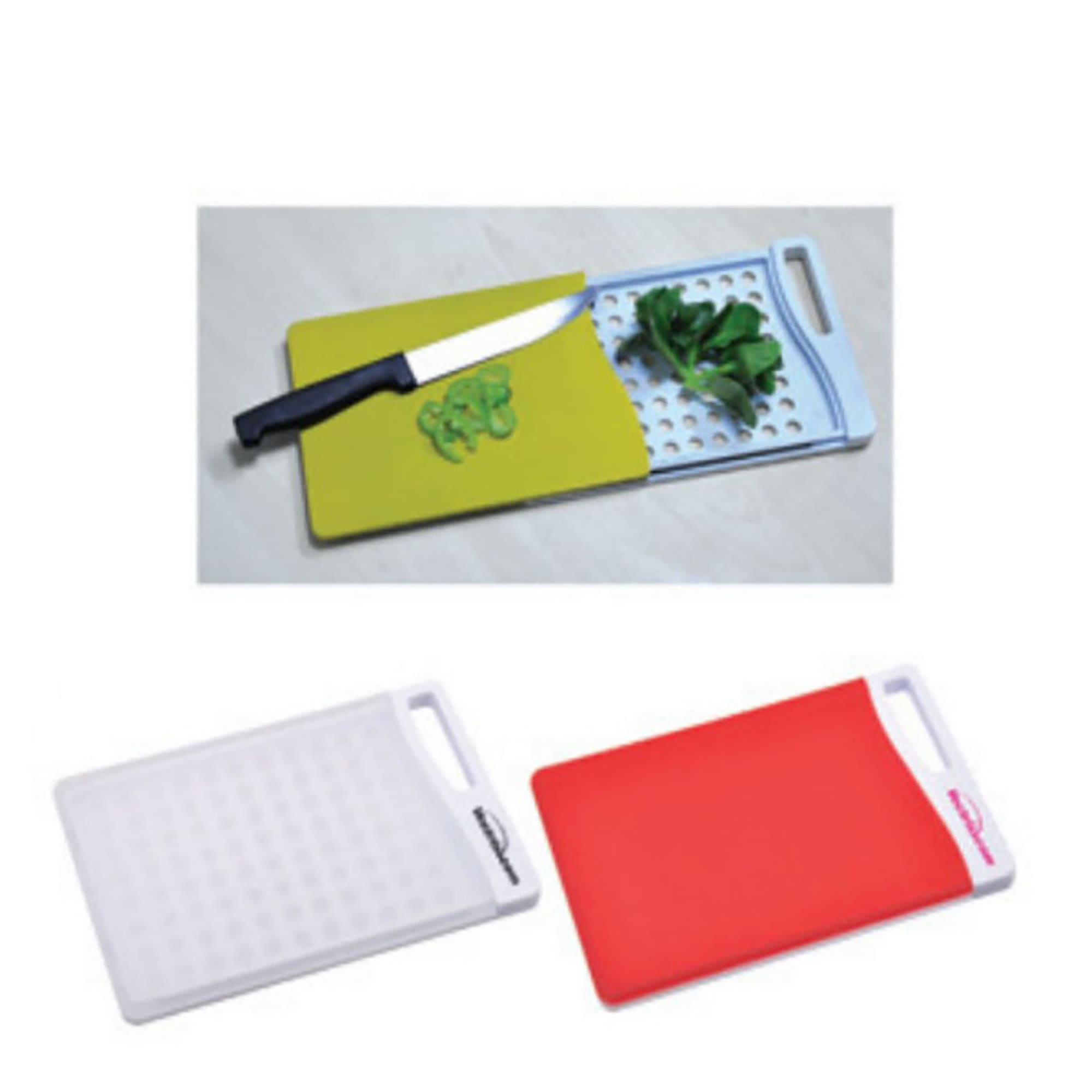 A set of chopping boards in white, red, and green, featuring a knife and chopped vegetables on one board. Cutting Board - Image 1