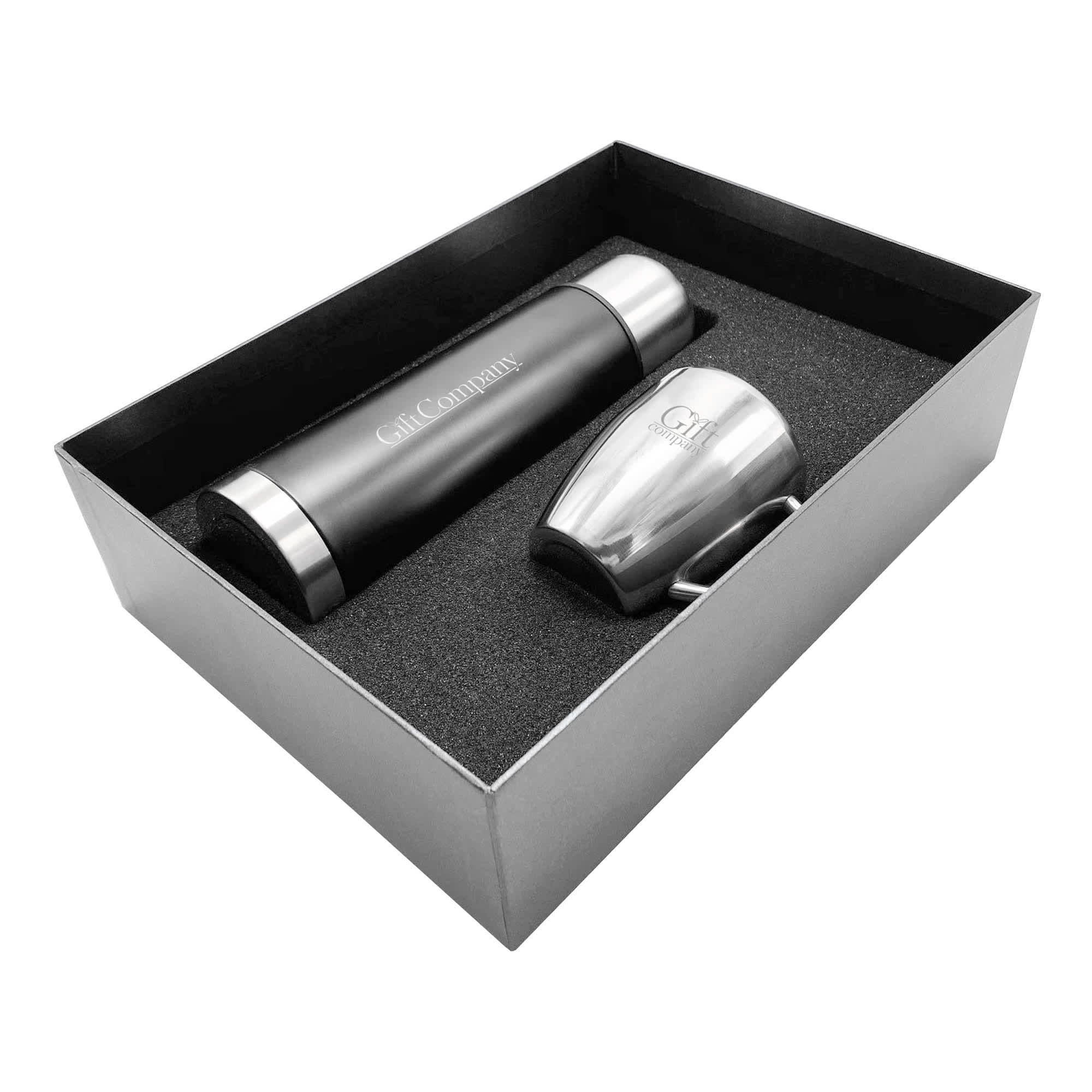 A drink bottle and cup in a sleek gift box, featuring a black and silver design and a branding logo. Compana Gift Set - Image 1