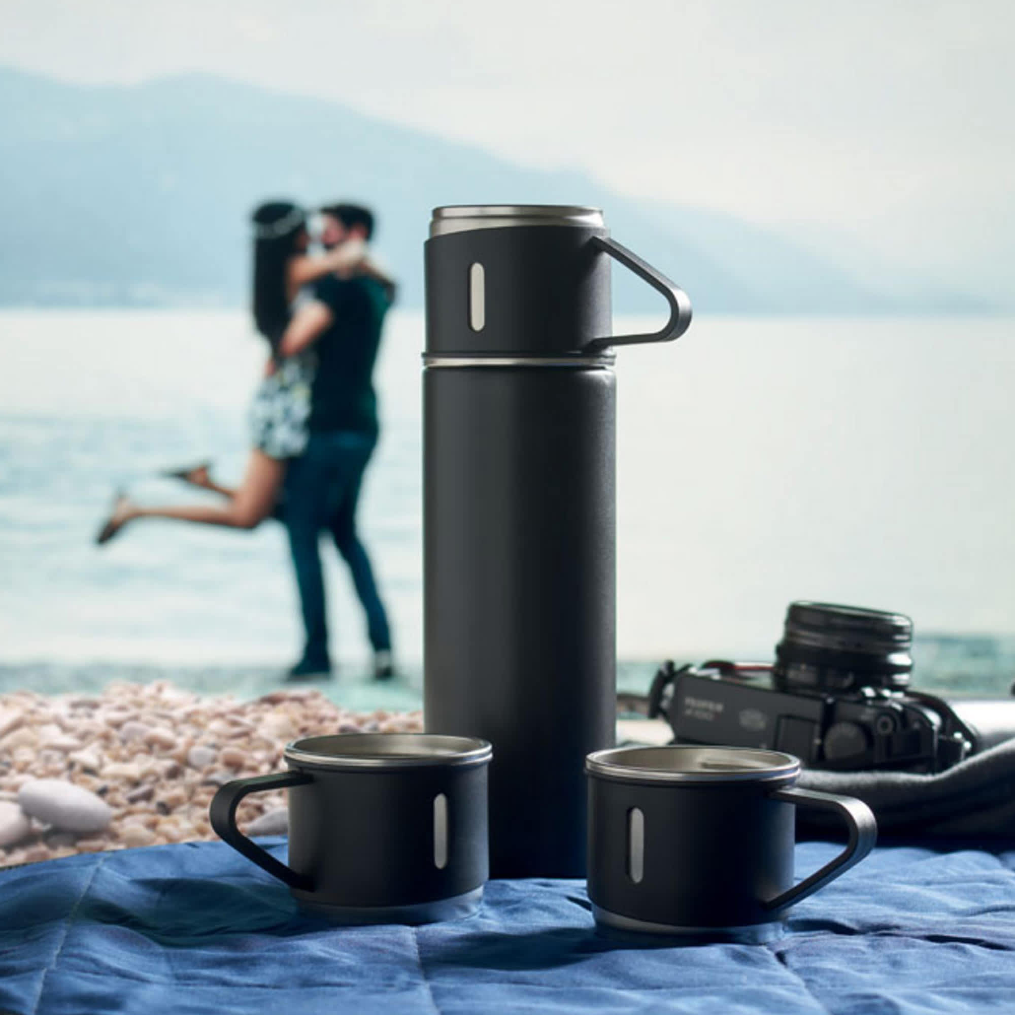 A drink bottle and two matching cups in matte black, featuring a handle and a logo. Urban Flask Gift Set - Image 1