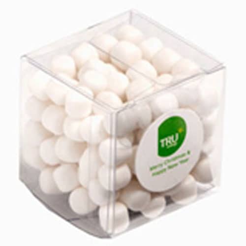 A transparent cube container filled with white chewy mints. Features a logo on the front of the packaging. Cube with Chewy Mints 60g - Image 1