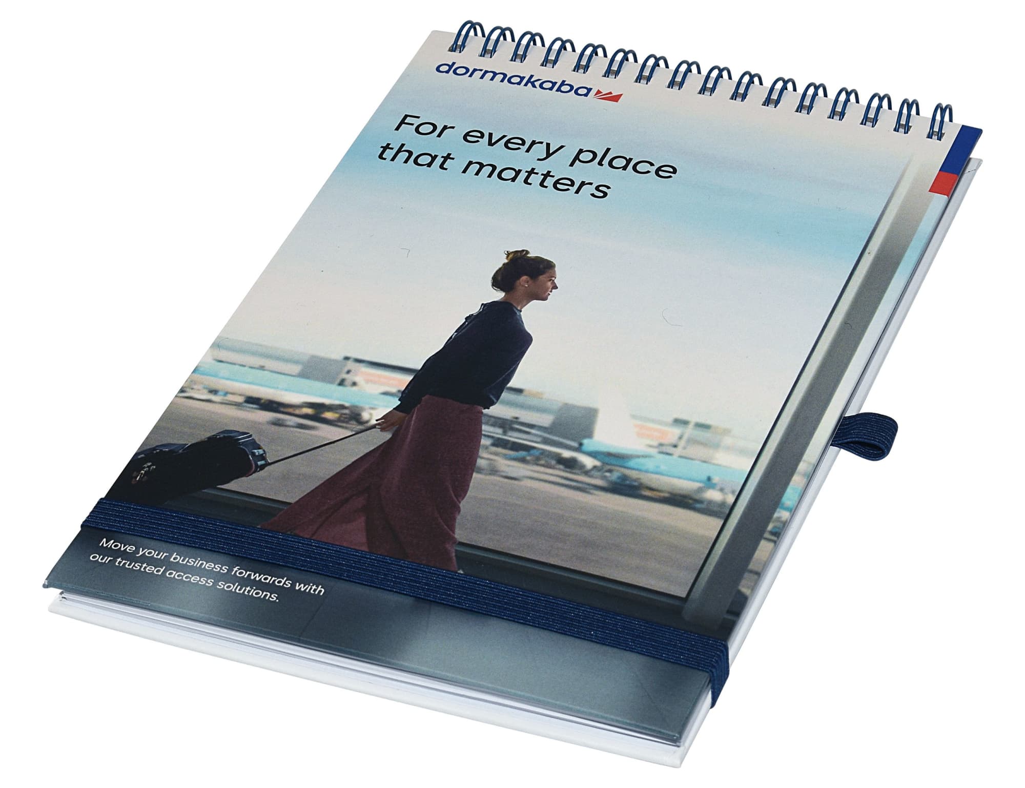 A top-bound A5 notebook with a spiral binding, featuring a blue and white cover design and a logo. Designa Wiro A5 Top Bound Notebook - Image 1