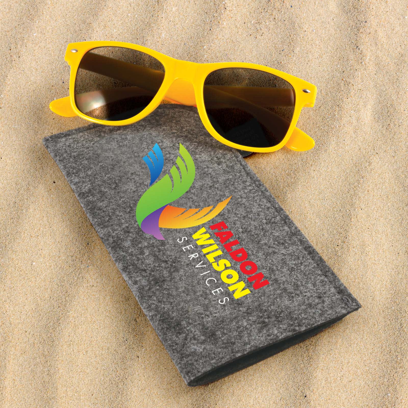 A pair of yellow sunglasses resting on a gray case, with a colorful logo on the case. Lux Sunglasses Pack - Image 1
