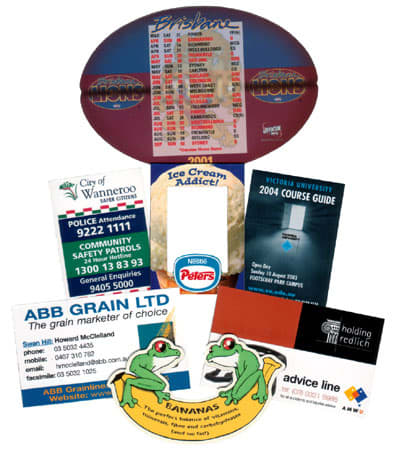 A collection of promotional fridge magnets featuring various designs, colours, and branding from different organisations. Fridge Magnet - 50 x 90mm - Image 1