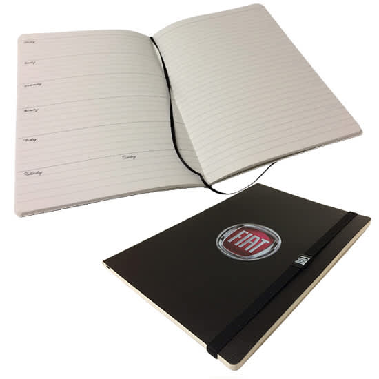 A dark notebook with a logo, featuring lined pages and an elastic closure, shown open and closed. PU Soft Cover 'Ruby' Notebooks (PUR Bound) - Image 1