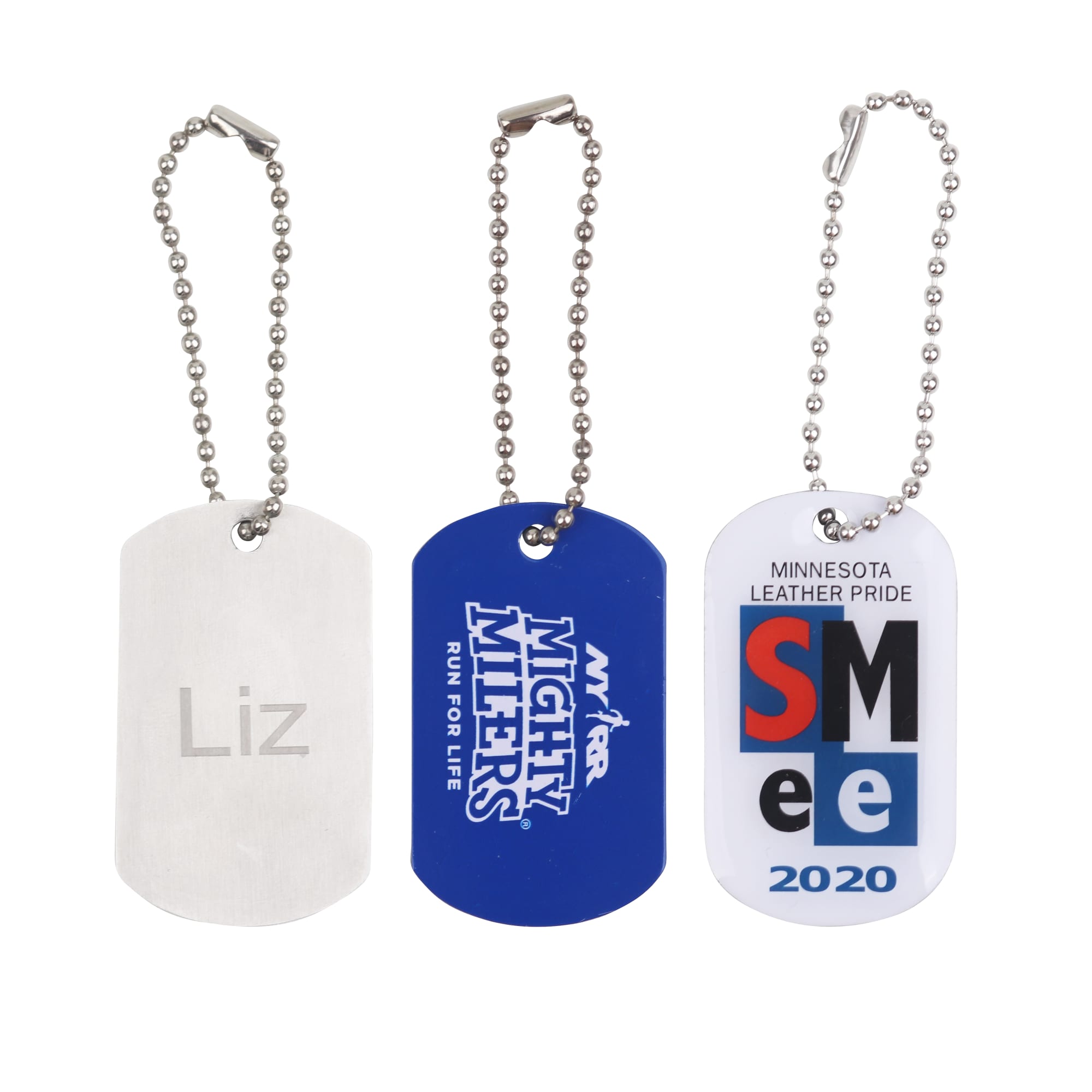 Three dog tags in silver, blue, and white, each with a chain attachment and various designs. Dog Tag - Image 1