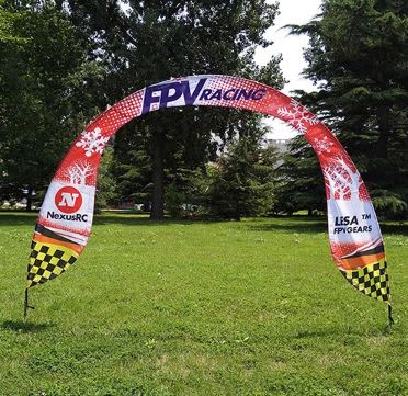 A promotional arch banner featuring red and black colours, with a checkered border and a logo on each side. Run Through Arch Banner - Image 1