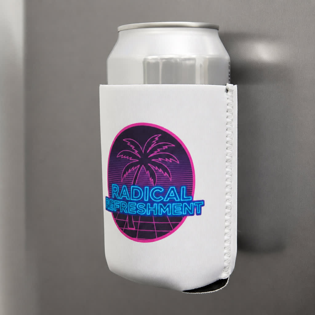 A drink bottle holder in white featuring a palm tree design, with a blue and pink logo, attached to a metallic surface. Magnetic Stubby Holder - Image 1