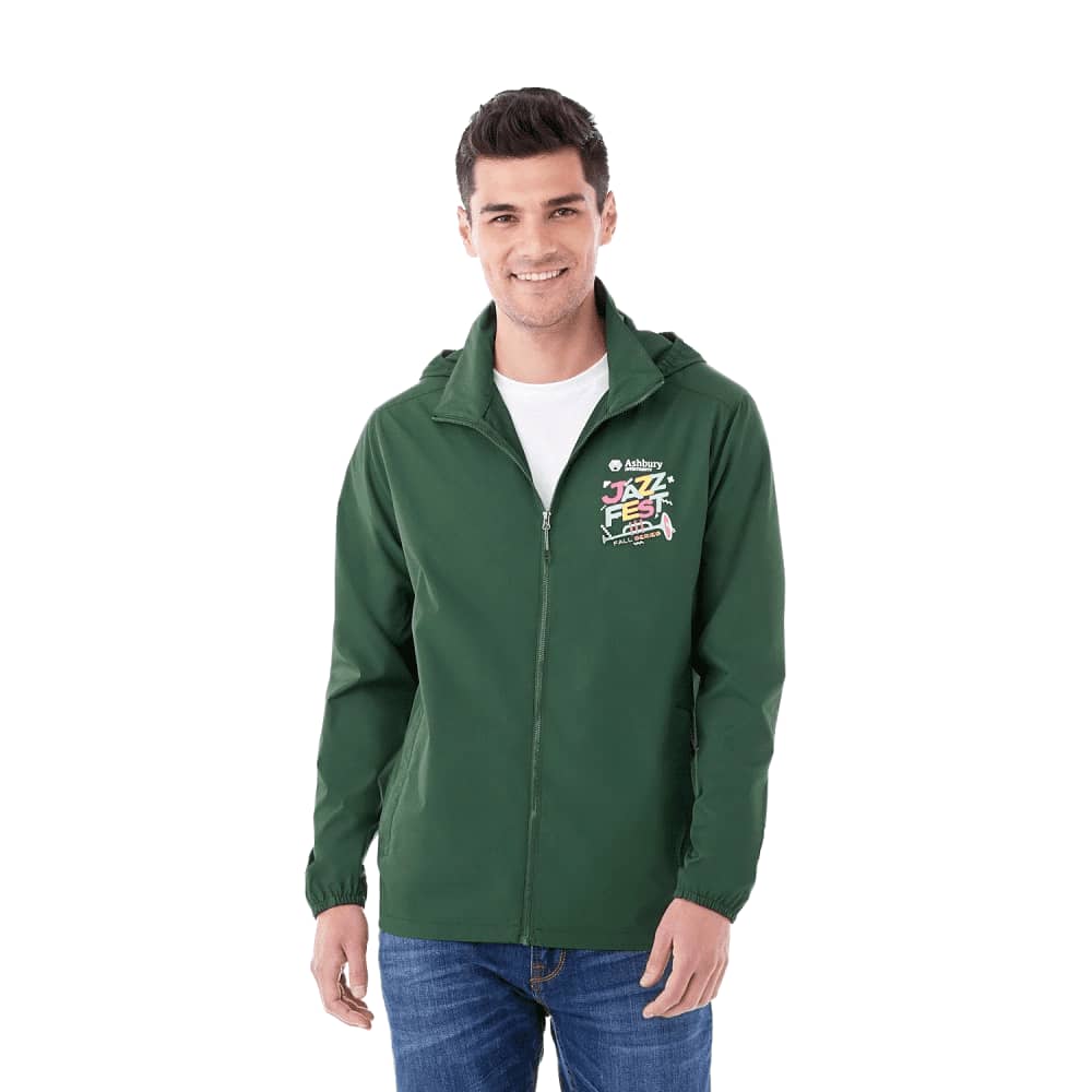 A man wearing a green packable rain jacket with a hood and a logo on the chest. Men's TOBA Packable Jacket - Image 1
