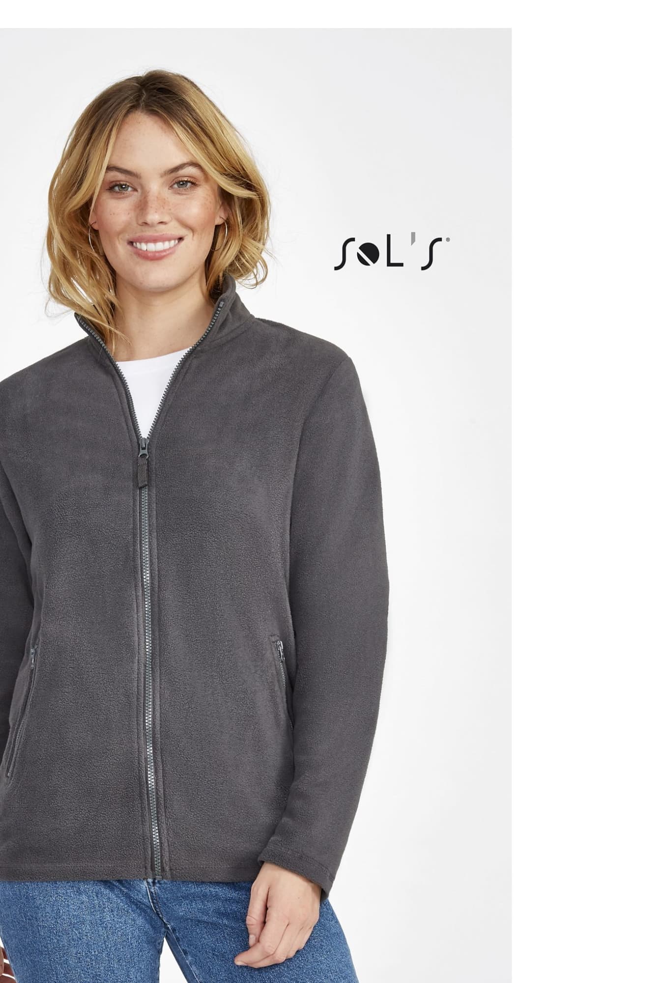 A women's plain fleece jacket in grey, featuring a zip front and a collar. It includes a branding logo. NORMAN WOMEN WOMEN'S PLAIN FLEECE JACKET - Image 1