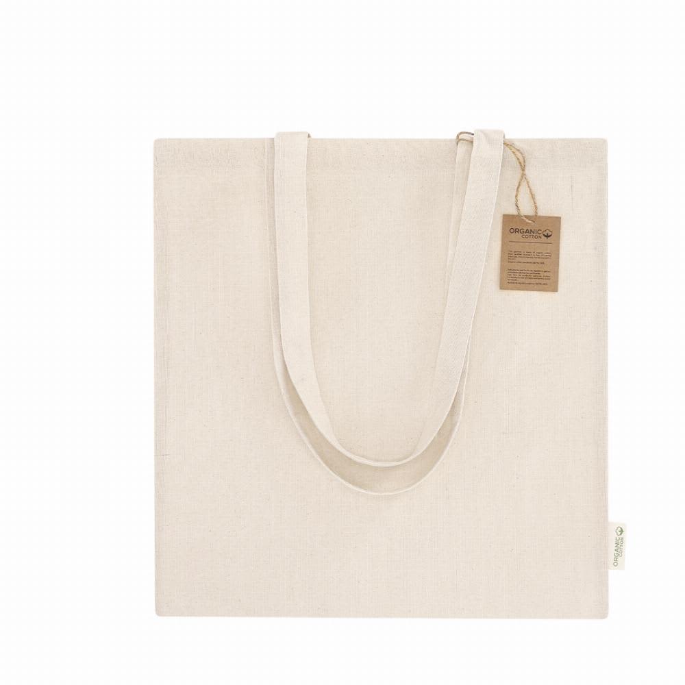 A canvas tote bag in a natural beige colour with long handles and a tag attached. It features a simple, clean design. Fizzy - Image 1
